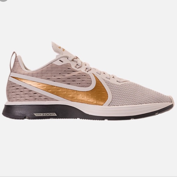 nike zoom strike 2 gold